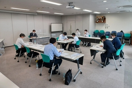 採用